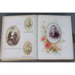 A Victorian leather-bound family photograph album containing forty-six family photographs.