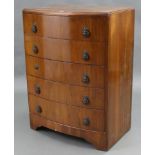 A mid-20th century walnut-finish bow-front chest, fitted five long drawers with cast-metal drop