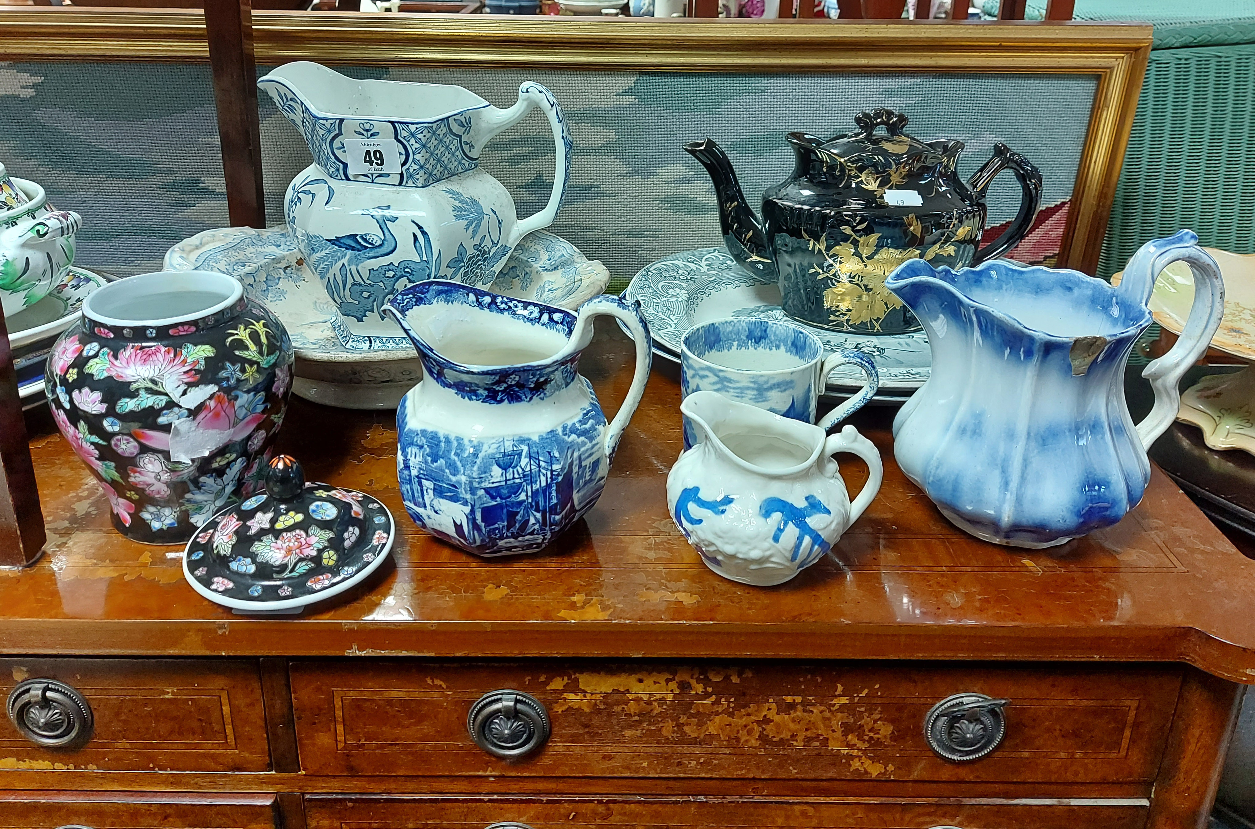 A collection of eight Victorian copper lustre jugs; a Mason’s Ironstone china “Mandalay” pattern