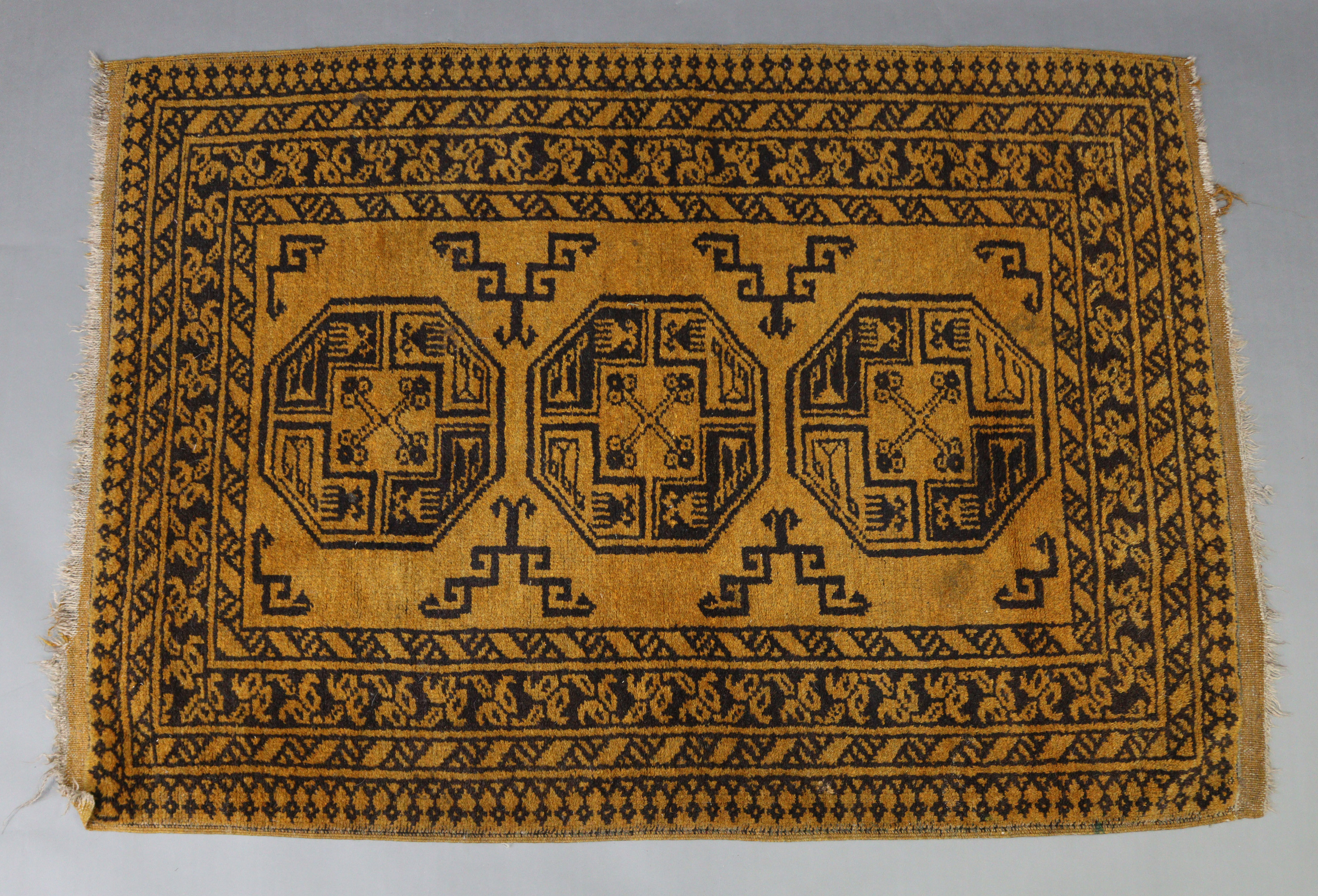 An Afghan rug of orange & black ground & with five ghuls to centre within a multiple border, 80” x - Image 2 of 3