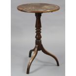 A 19th century mahogany tripod table with circular tilt-top, & on vase-turned centre column &
