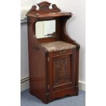 A Victorian carved mahogany marble-top bedside cabinet inset bevelled mirrored plate to the
