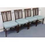A set of four early 20th century mahogany splat-back dining chairs with padded seats, & on square