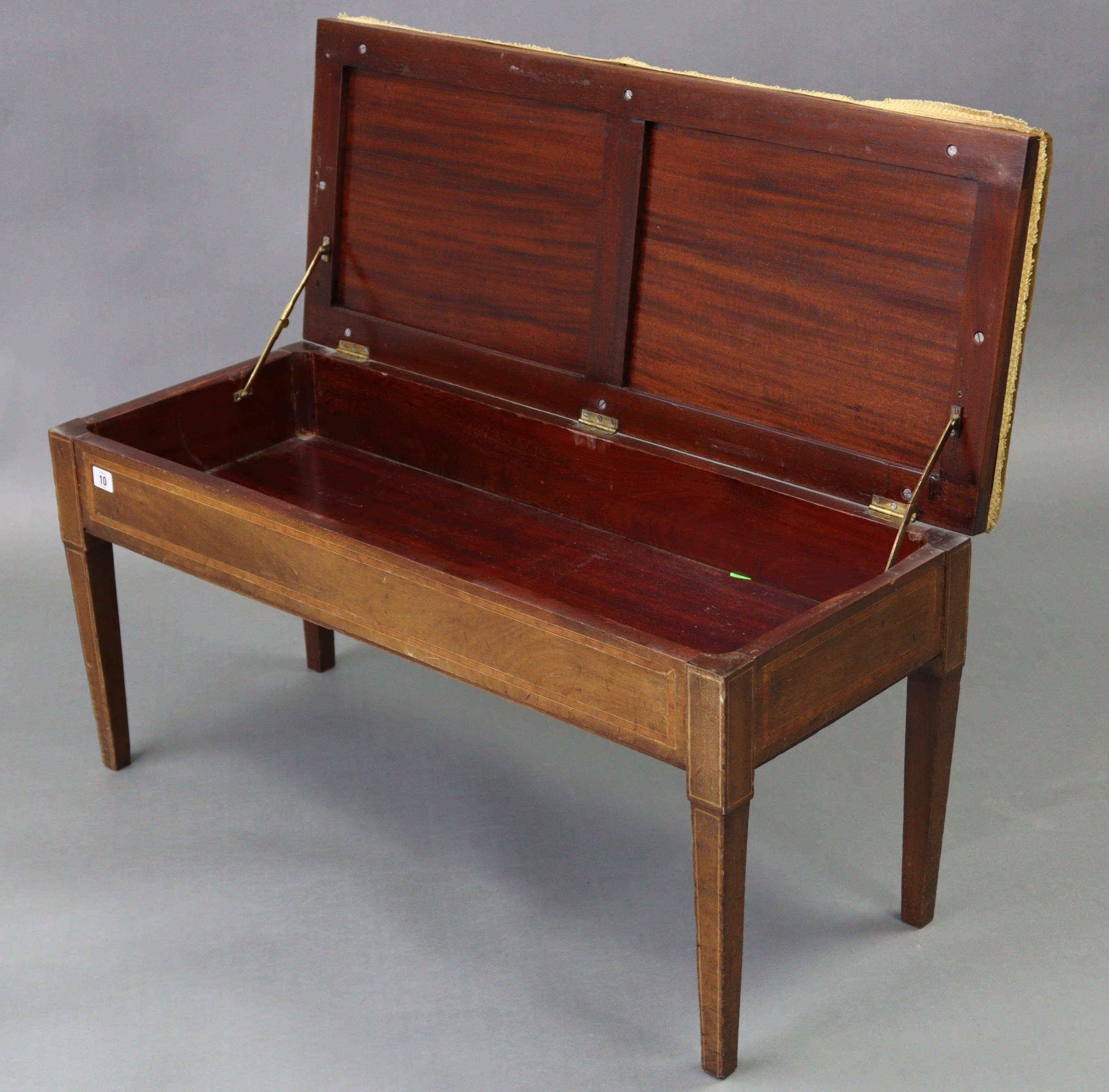 An Edwardian inlaid mahogany “duet” piano stool with padded hinged seat, & on four square tapered - Image 3 of 3