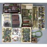 A collection of Britains “Floral Garden” models including flowers, greenhouses, etc.; together
