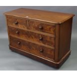A Victorian figured mahogany low chest fitted two short & two long graduated drawers with turned
