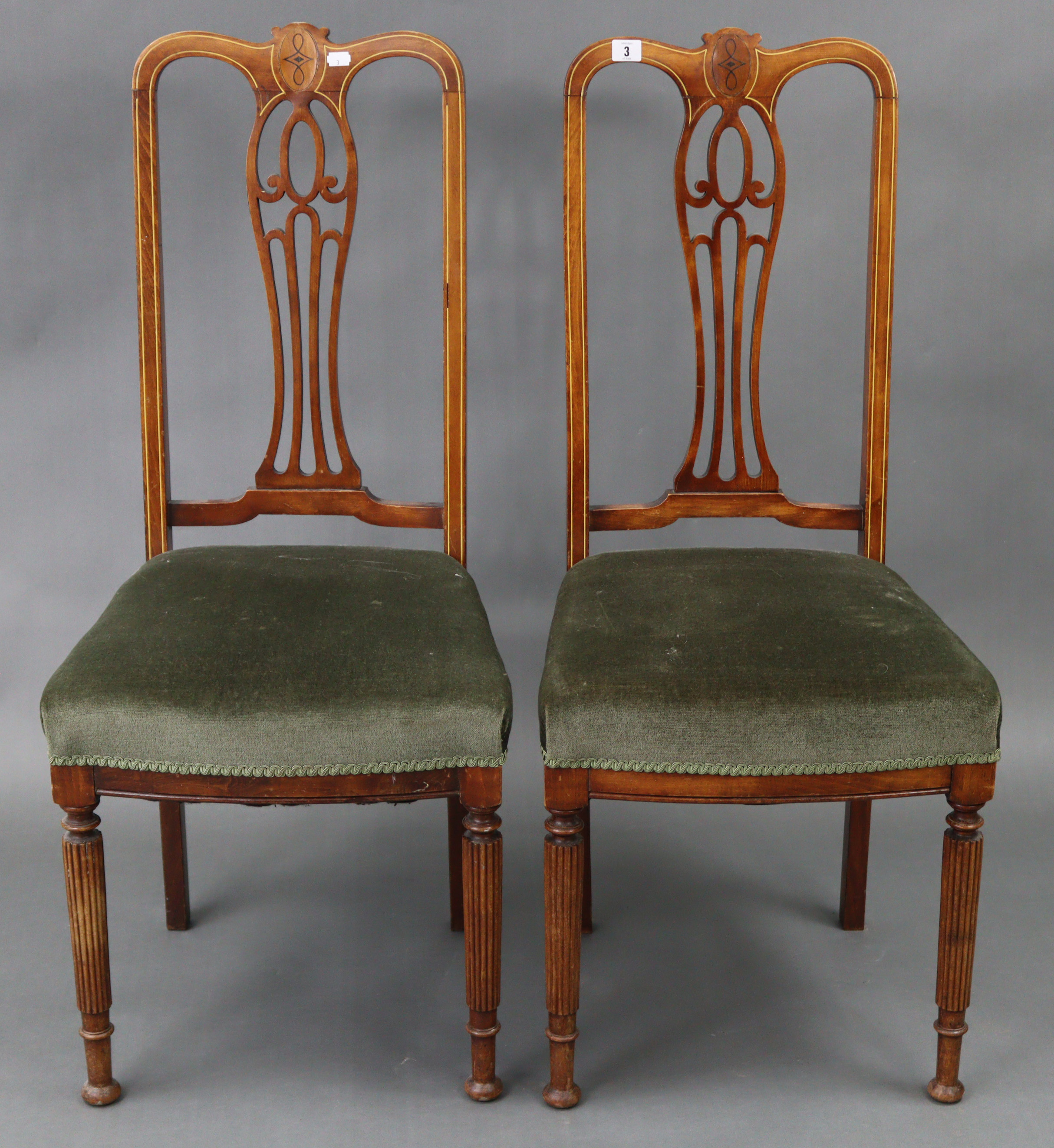 A pair of late 19th/early 20th century inlaid-mahogany splat-back occasional chairs with padded