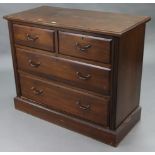 A late Victorian mahogany chest fitted two short & two long graduated drawers with brass swing