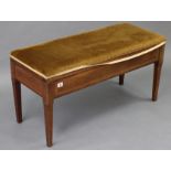 An Edwardian inlaid mahogany “duet” piano stool with padded hinged seat, & on four square tapered