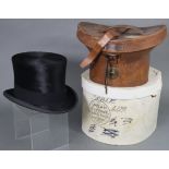 A late 19th century black silk top hat by Lock & Co. of St James’s Street, London (size 7?), with