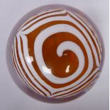 A Whitefriars white and randomly lined, opaque orange glass domed paperweight 3.