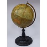 A late Victorian printed paper covered political 10'' globe, rotating on a gilded metal frame,