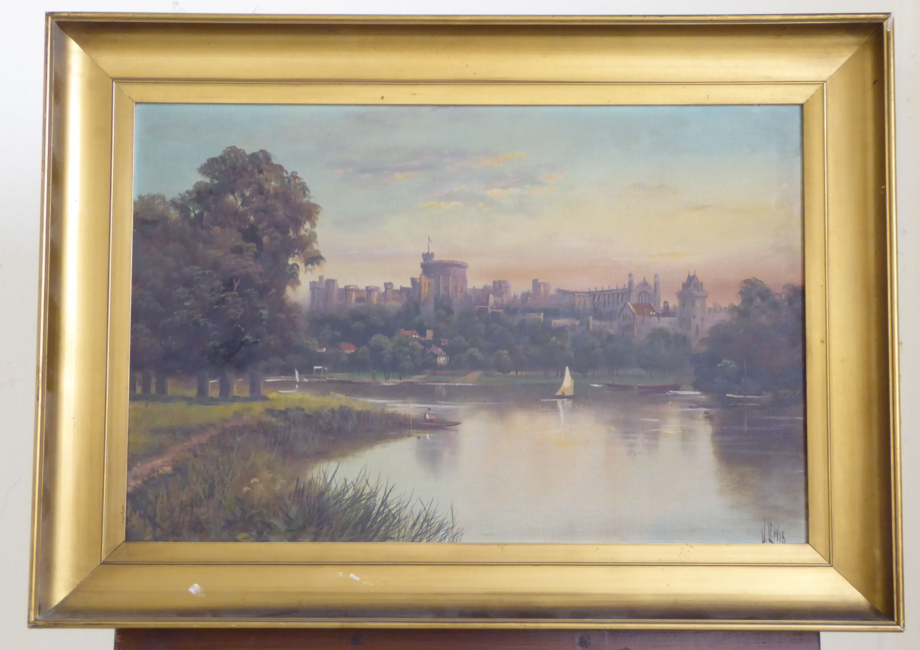 J Lewis - an early evening view of Windsor Castle from the River Thames oil on canvas bears a