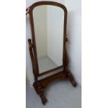 A late Victorian gentleman's dressing room cheval mirror,