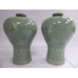 A pair of 20thC Korean celadon glazed porcelain vases of baluster form,
