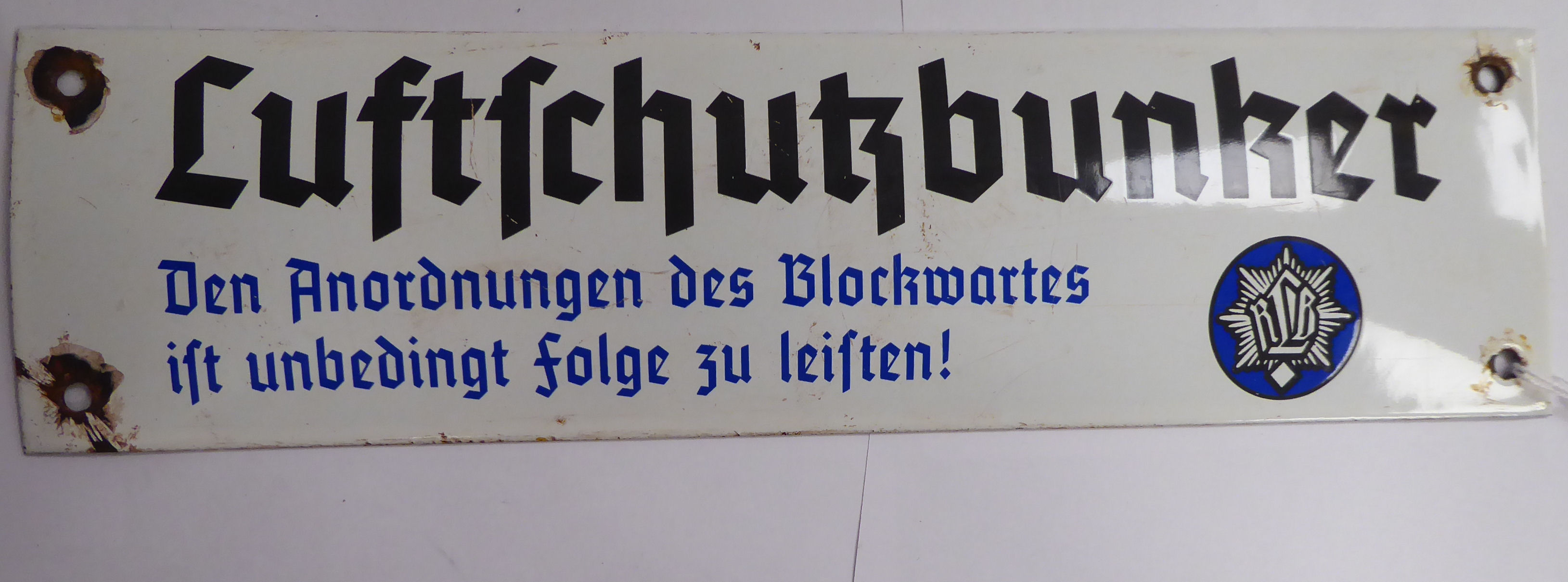 A German black and blue on white enamelled steel ARP sign 3'' x 12'' (Please Note: this lot is