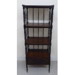 An early/mid 19thC rosewood four tier whatnot with a galleried upper level,