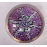 A Whitefriars domed Millefiori glass paperweight with long canes and trailing strands 3.