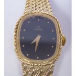 A lady's Omega 9ct gold oval cased, flexible link bracelet wristwatch,