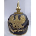 A Great War German officer's pickelhaube with chin scales (Please Note: this lot is offered