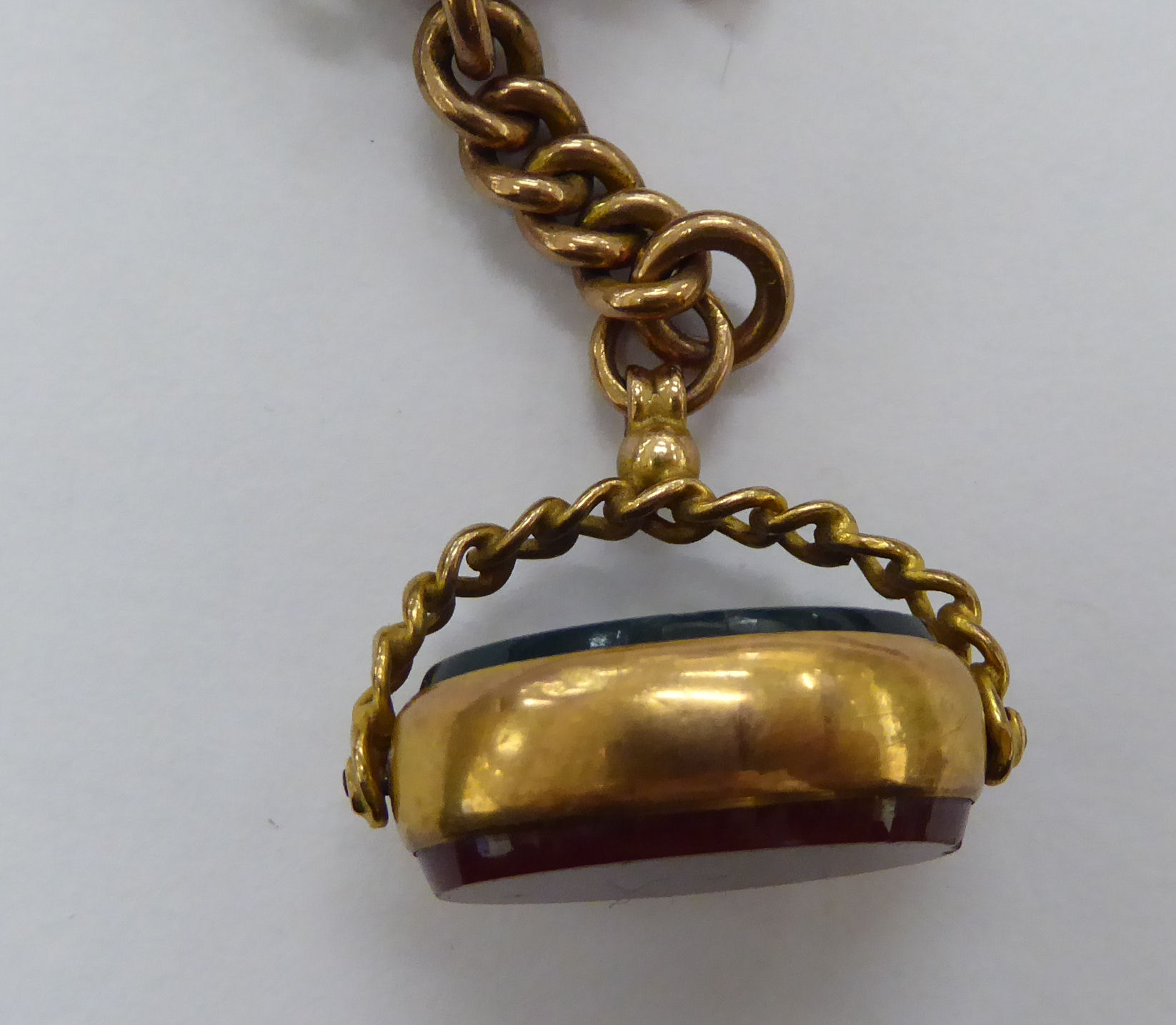 A 9ct gold fob watch double chain with a T-bar and swivel bloodstone set pendant 11 - Image 3 of 3