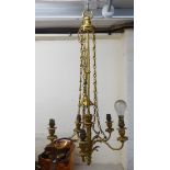A 20thC gilded cast brass 'antique' design, five branch hanging centre light with rope,