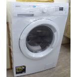 An (unused) Zanussi Lindo 1000 Wash & Dry, in white casing 33''h 23.