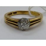 An 18ct gold claw set diamond solitaire ring 11