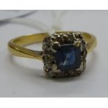 An 18ct gold sapphire and diamond cluster ring 11