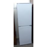 An (unused) Zanussi integrated 50/50 fridge/freezer,