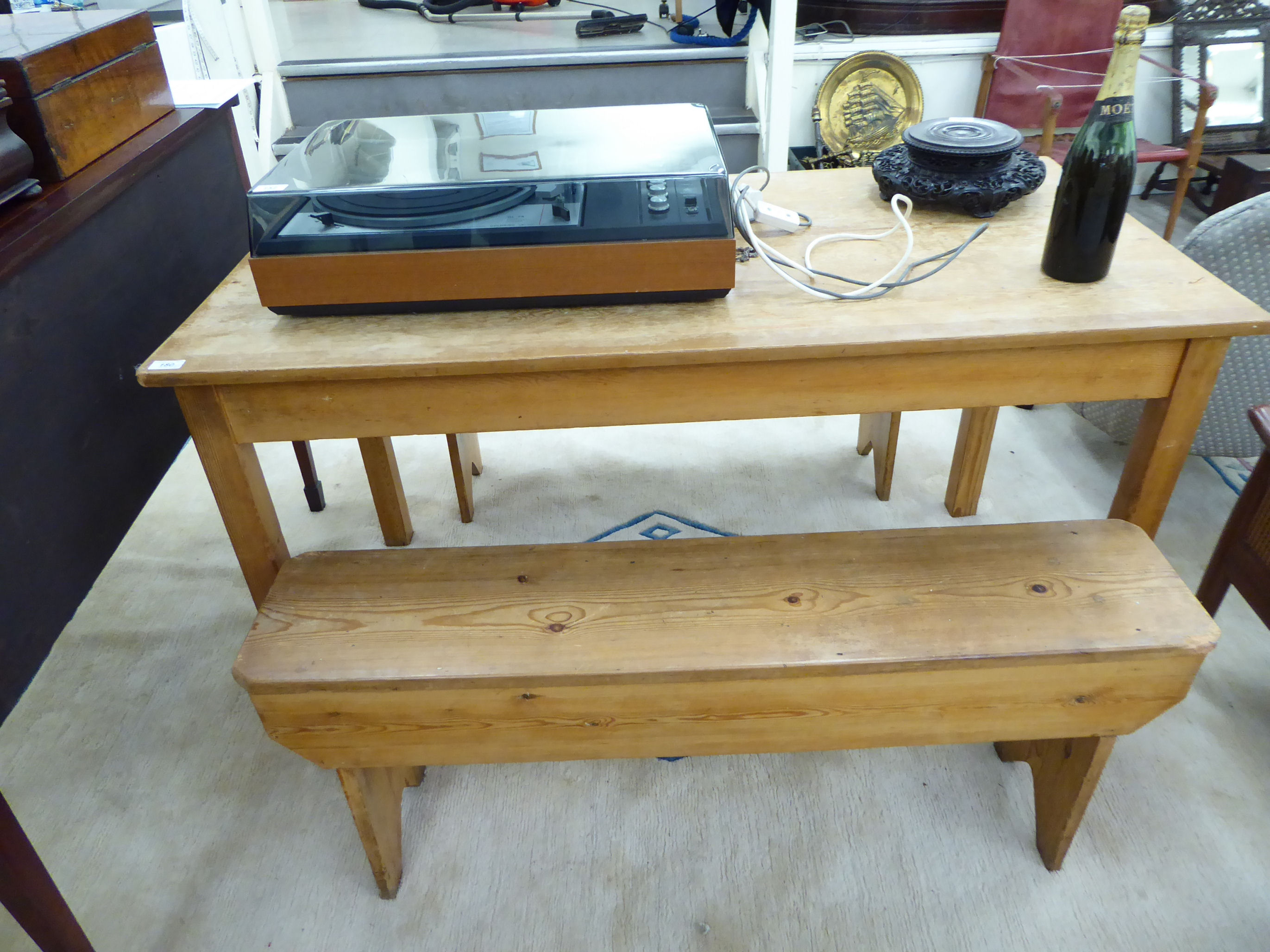 A modern honey coloured pine breakfast table,