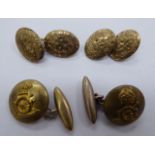 Two pairs of brass cufflinks,