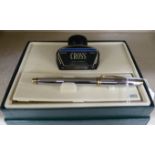 A Cross bi-coloured stainless steel cased presentation fountain pen,
