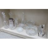Mixed dissimilarly cut crystal and glass tableware: to include a cordial jug with an applied silver