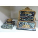 An early 20thC mottled green marble and gilt metal mounted,