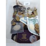 A mixed lot: mainly uncollated coins and banknotes OS10