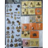 Uncollated military cap badges (some copies): to include Royal Kent,