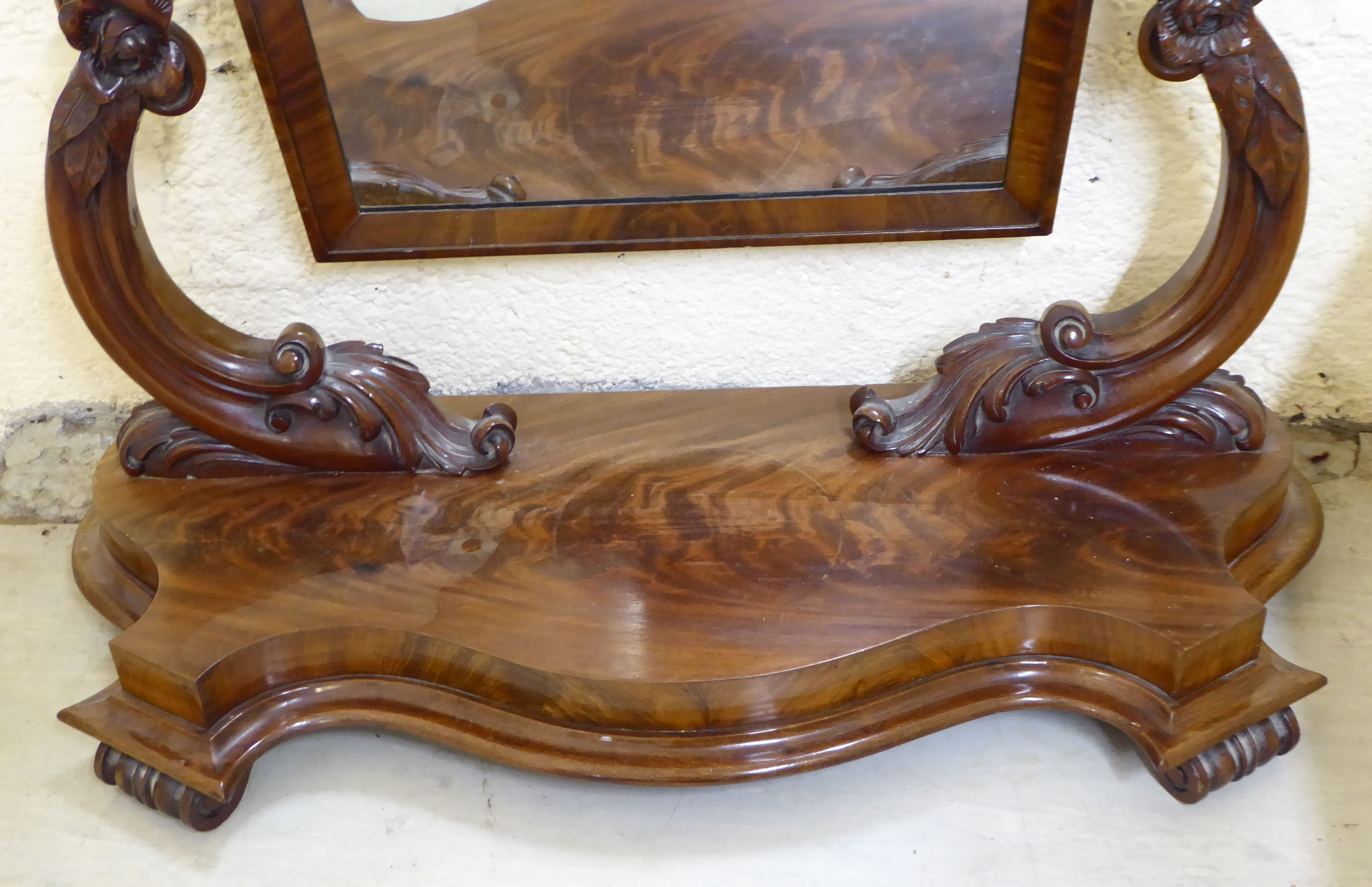 A late Victorian mahogany dressing table mirror, the arched plate set between foliate moulded, - Image 2 of 2