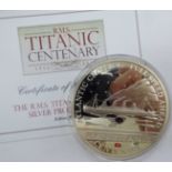 A silver proof 5oz coin,