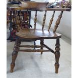 An early 20thC beech and elm framed smokers bow,