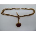 A 9ct gold fob watch double chain with a T-bar and swivel bloodstone set pendant 11