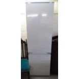 A Zanussi (unused) integrated 70/30 fridge freezer 70''h 22''w BSR