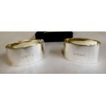 A pair of silver plain oval band design napkin rings London 1996 cased 11