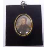 An early 19thC oval head and shoulders portrait miniature,