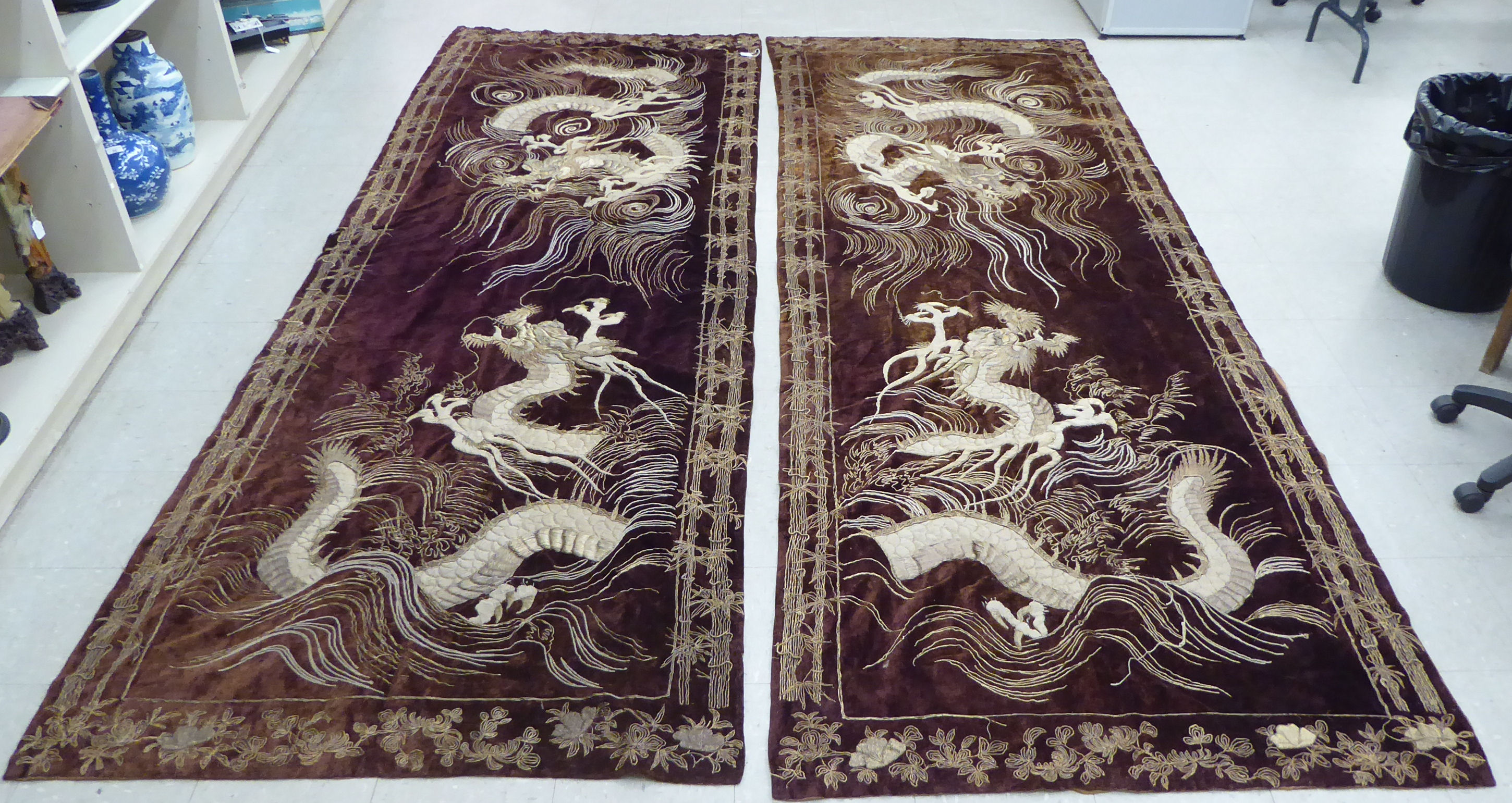 A pair of circa 1960/70s Chinese embroidered wall hangings,