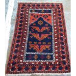 A Turkish prayer rug, decorated with foliage, stars and stylised design,