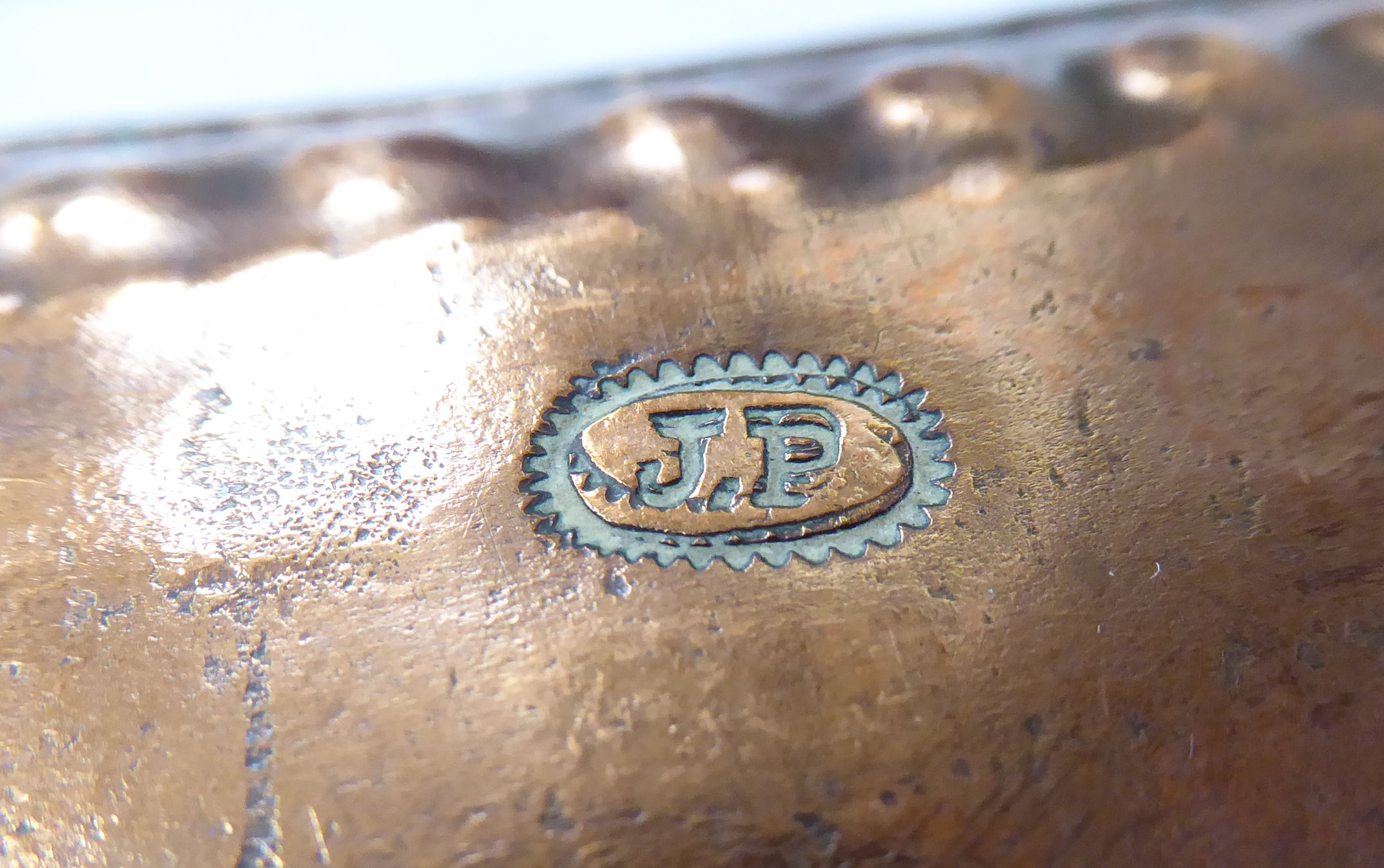 An Arts & Crafts twin handled copper tray with spot-hammered decoration to the border bearing the - Image 4 of 4