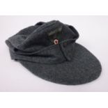 A German Arrny 1944 ski cap with an embroidered spreadeagle and swastika emblem (Please Note: this