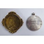 WITHDRAWN A 1780 Maria Theresa silver Thailer, on a pendant ring; and a Victorian sovereign,