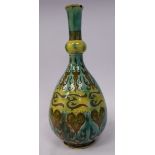 A Della Robia pottery 'Tall Persian Vase' of ovoid form, having a long, narrow,